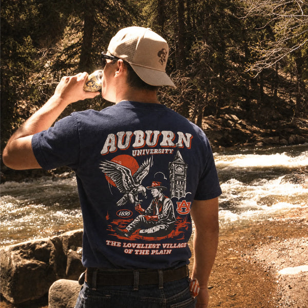 Auburn University Western Collection Tee in navy, worn by a river