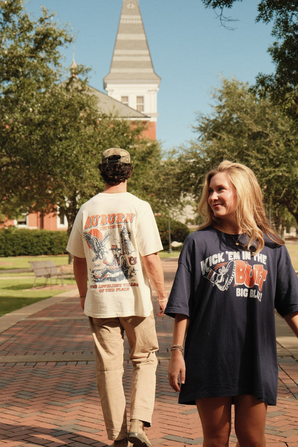 Navy, walking past the clock tower